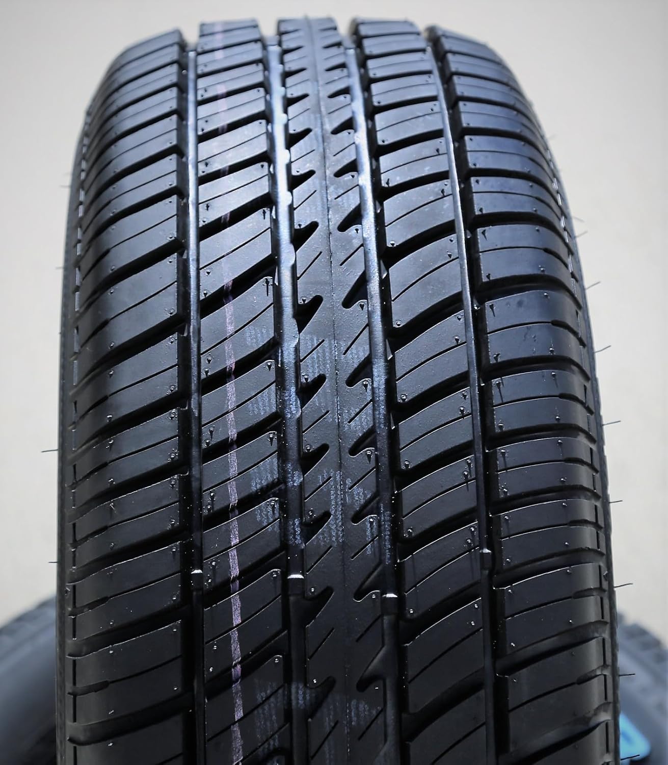 215/70R14 All-Season Radial Tire with Raised White Letters C778770